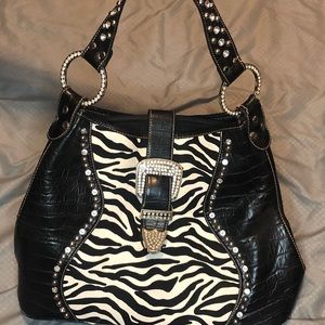 Zebra Print Purse with studs and buckle.